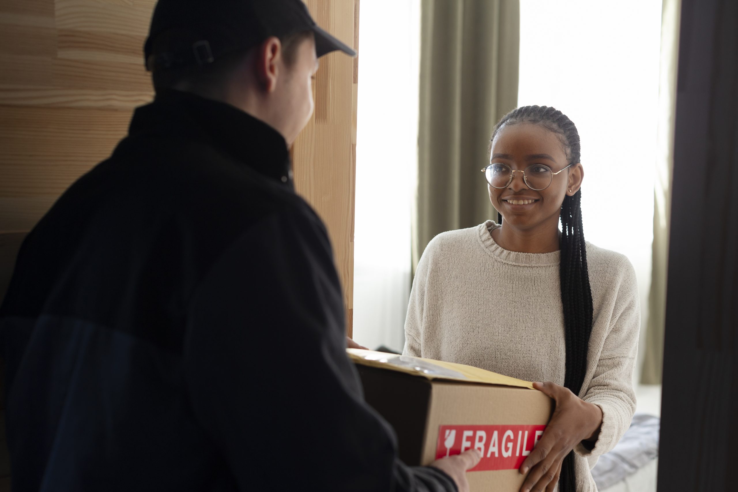 courier delivering parcel client
